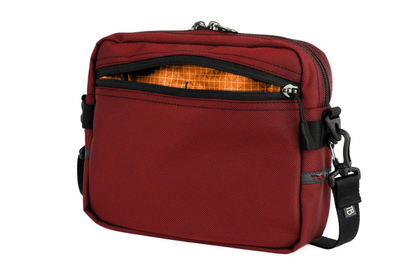 The Side Kick in Mars Red Ballistic with an Zest (orange with white grid) 200 Halcyon interior.
